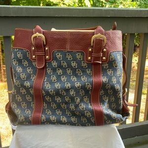 EUC Dooney Bourke Large bucket pocketbook. Its The color of denim & maroon